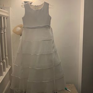 A little girls white dress.